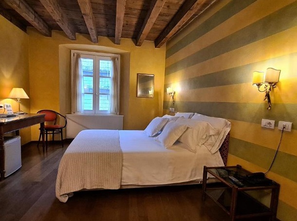 Una camera dell'hotel Piazza Vecchia di Bergamo alta